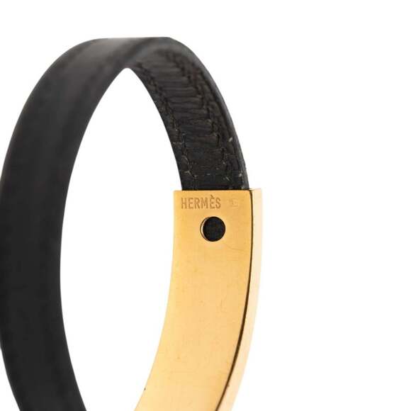 Hermes Puspus Bracelet in Black Gold Plated Leather for Women